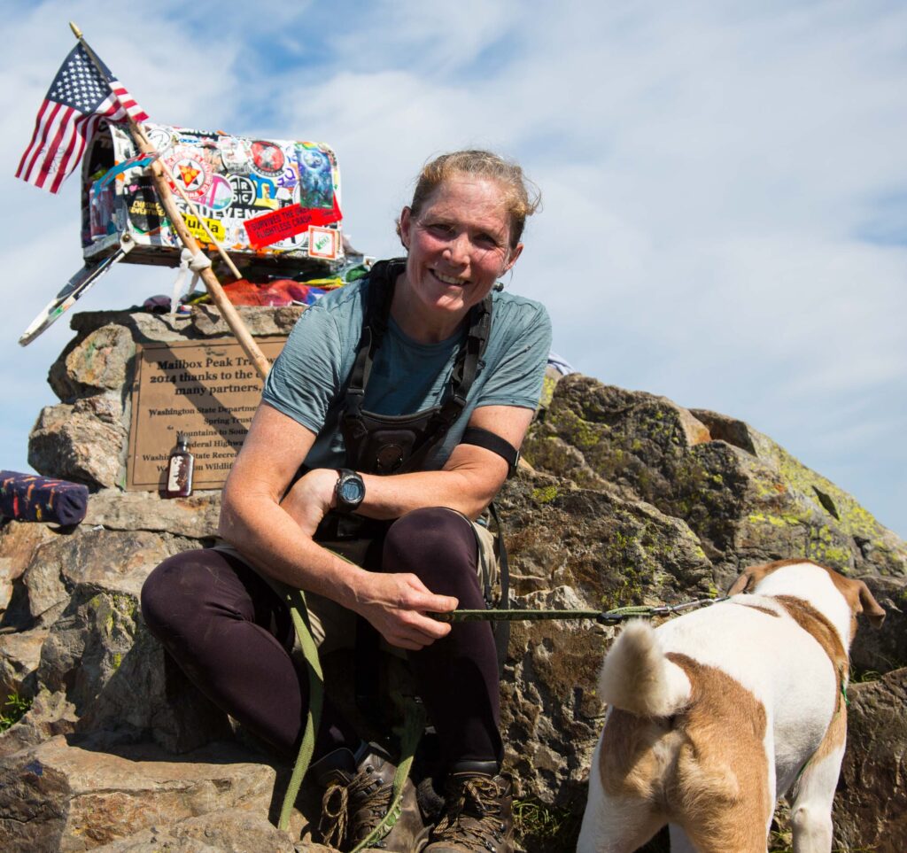 The author and Ajax pose on the summit of Mailbox Peak.