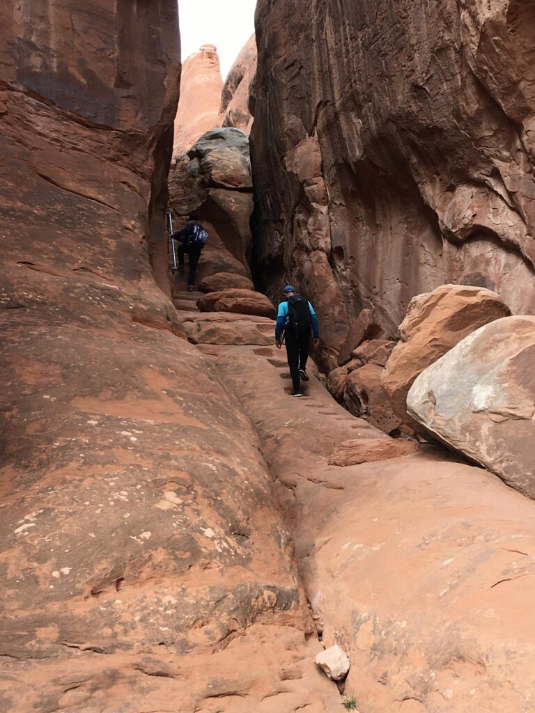 Manmade stairs crafted into the rock to provide entry/exit.