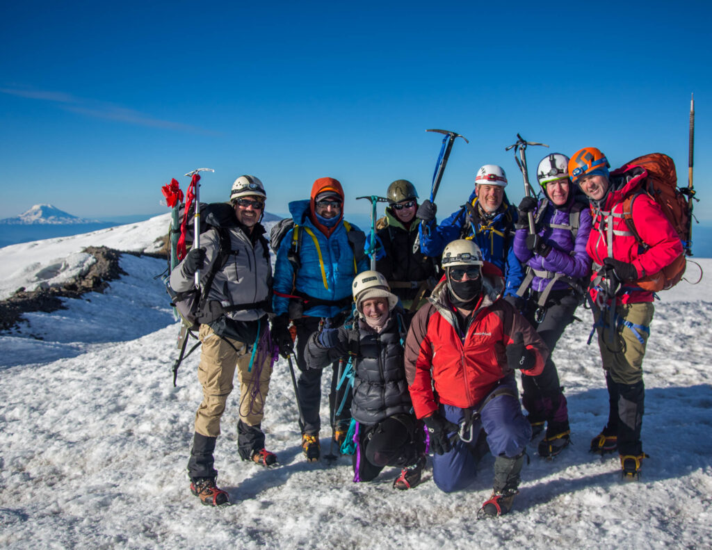 Our team of eight, successfully stands on Mt. Rainier's summit at 14,411 feet on 7.9.17.