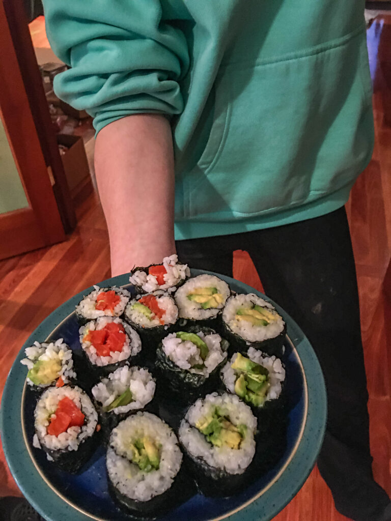 Homemade avocado rolls and salmon rolls. My teen-aged daughter makes some great sushi and loves eating whatever she prepares.