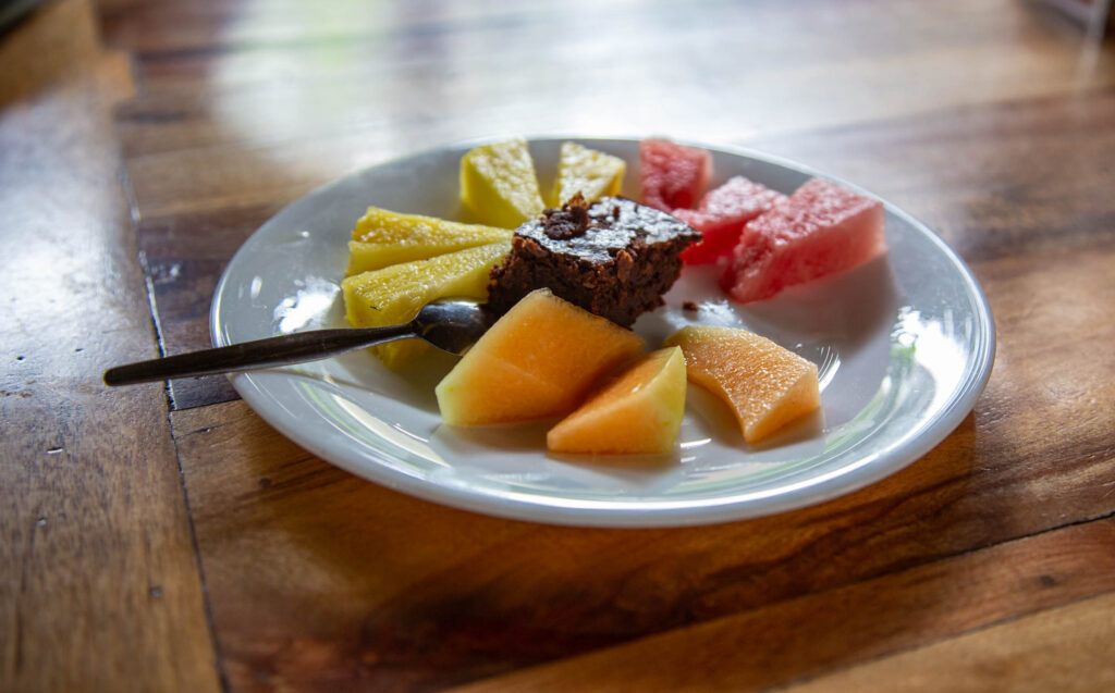Bites of organic tropical fruit with a delectable brownie, included in our chocolate factory tour during a trip to the Galapagos Islands. No food is "bad" as long as you know how to fully savor and enjoy your food without shame or guilt.