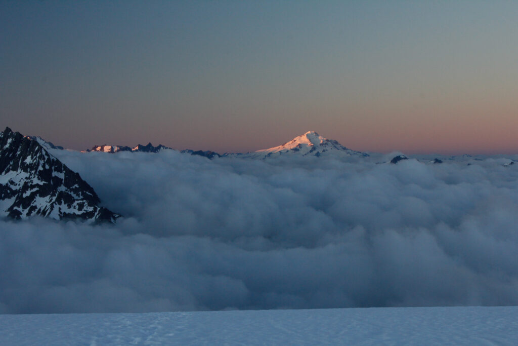 Glacier Peak from above the cloud line on Eldorado, 2010. When you only get one climb a year, you put everything into it.