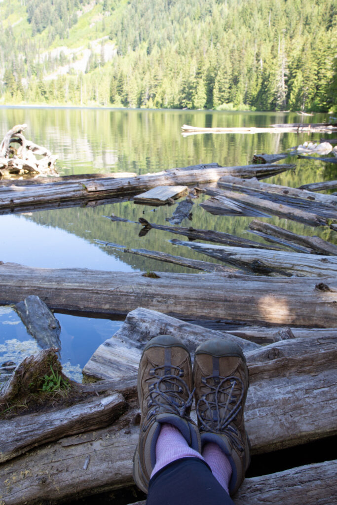 I prevent foot discomfort by wearing my favorite pair of trail shoes with a lightweight liner and pair of midweight wool socks.