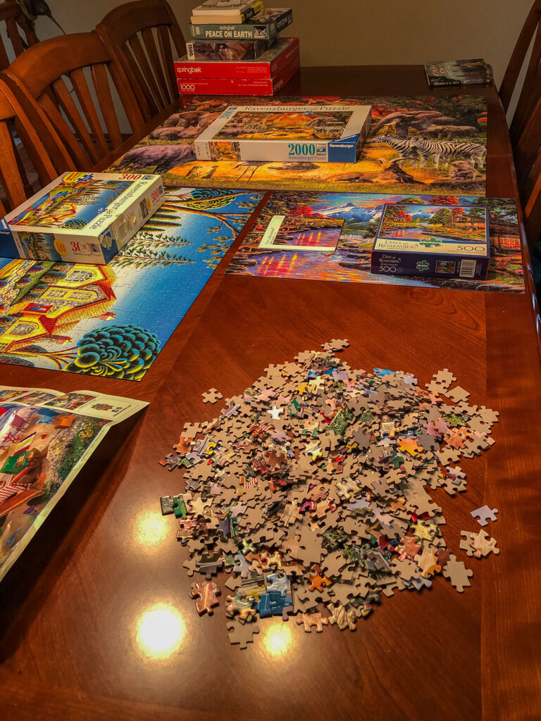 Jigsaw puzzles I acquired by trading those I no longer wanted for those I could enjoy. Put together your own solution, one piece at a time.