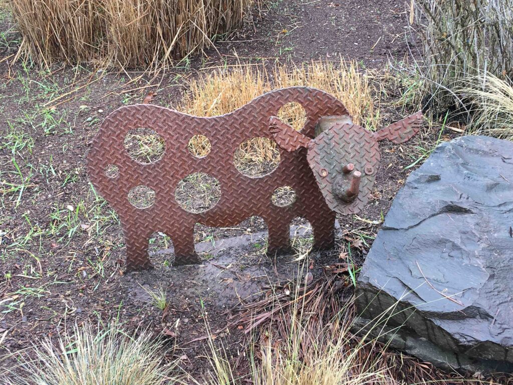 A metal rhino sculpture in the Pinehurst Playfield neighborhood made me think of my 8 years as a Zoo volunteer.