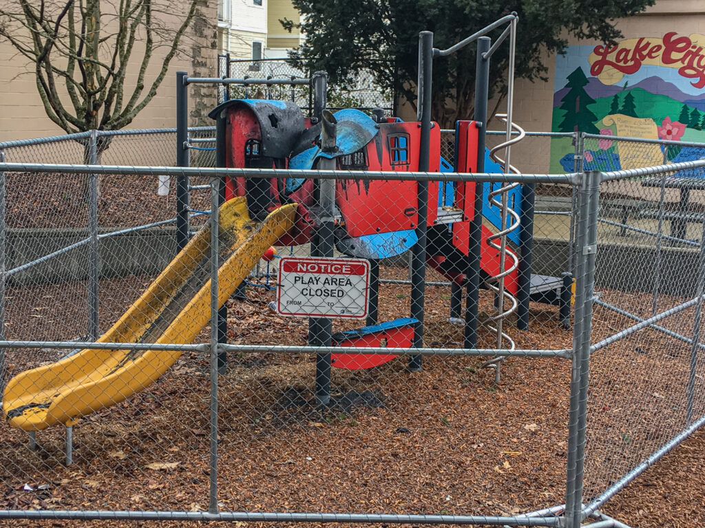 Albert Davis Park, a playground near Lake City Library. My guess is this fire might have been started by the homeless using the play structure as a windbreak to cook their food. I've seen them do the same thing at a bus stop.