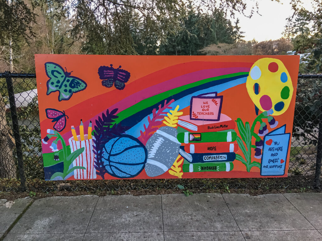 One of three colorful murals outside the Cedar Park Elementary School.