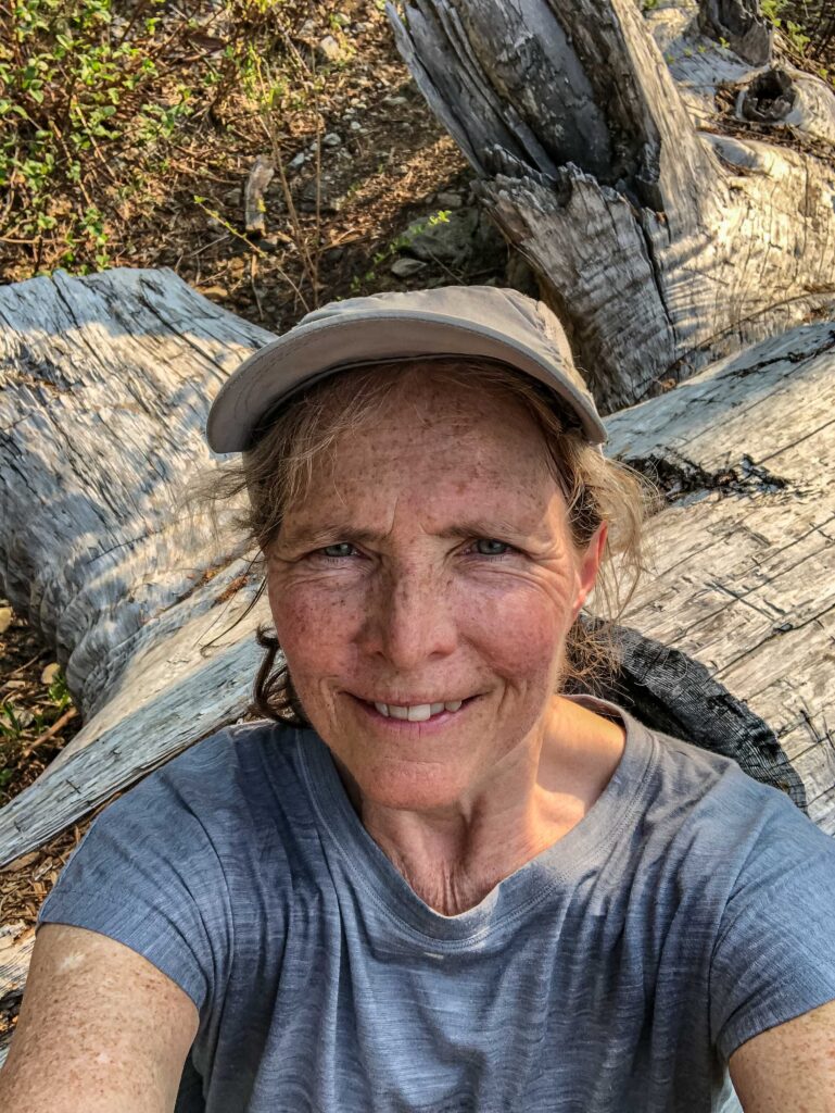 The author's selfie was taken while reclining on a carved tree bench roughly 1.5 miles from the summit.