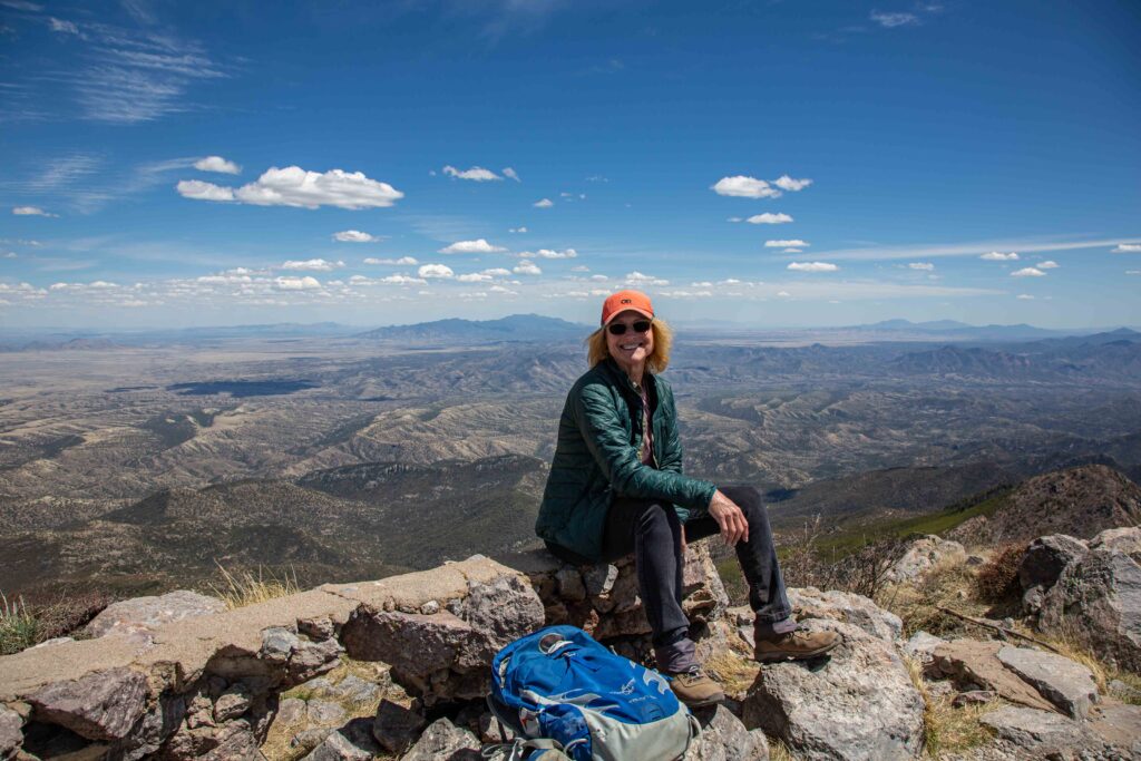 Pam enjoying the summit of Mt. Wrightson.