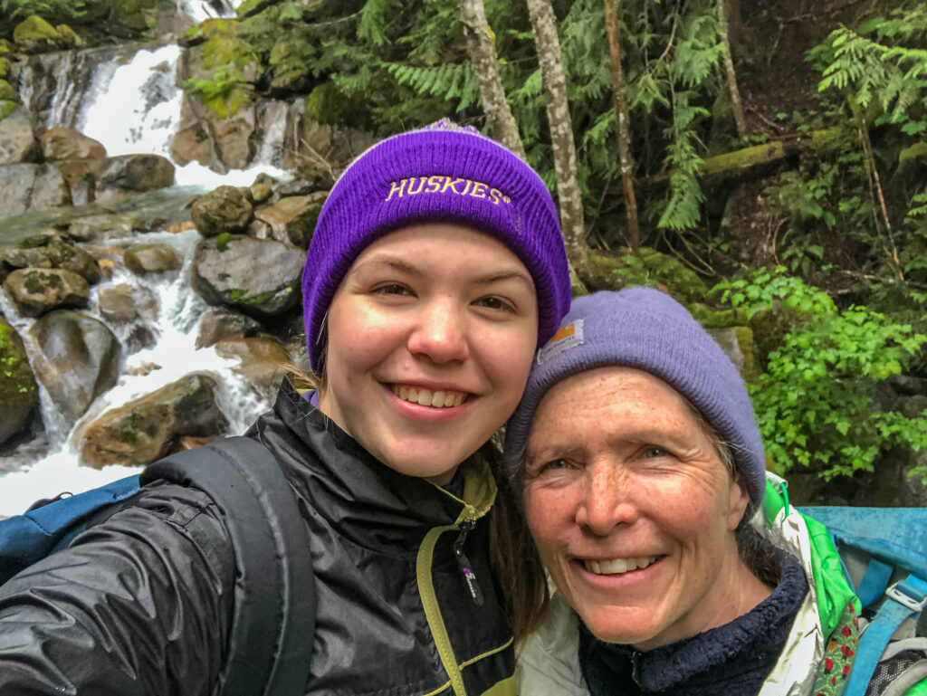 My UW Husky student and I pose for a selfie in front of the lower falls.