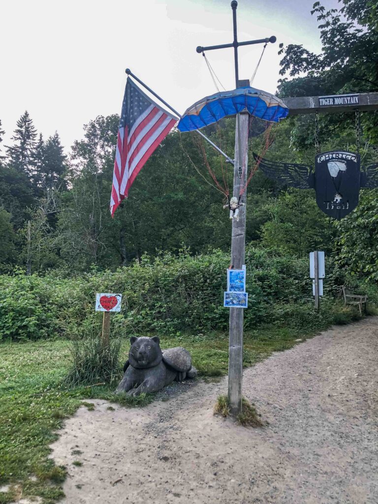 Cross to the "obvious trailhead", in this case, marked with a parachute and flag.