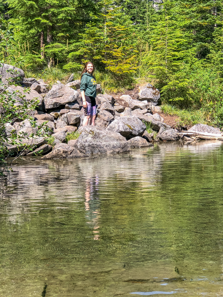 My daughter approached the shallow, warm waters of Granite Lake where I was wading quite a ways from shore.