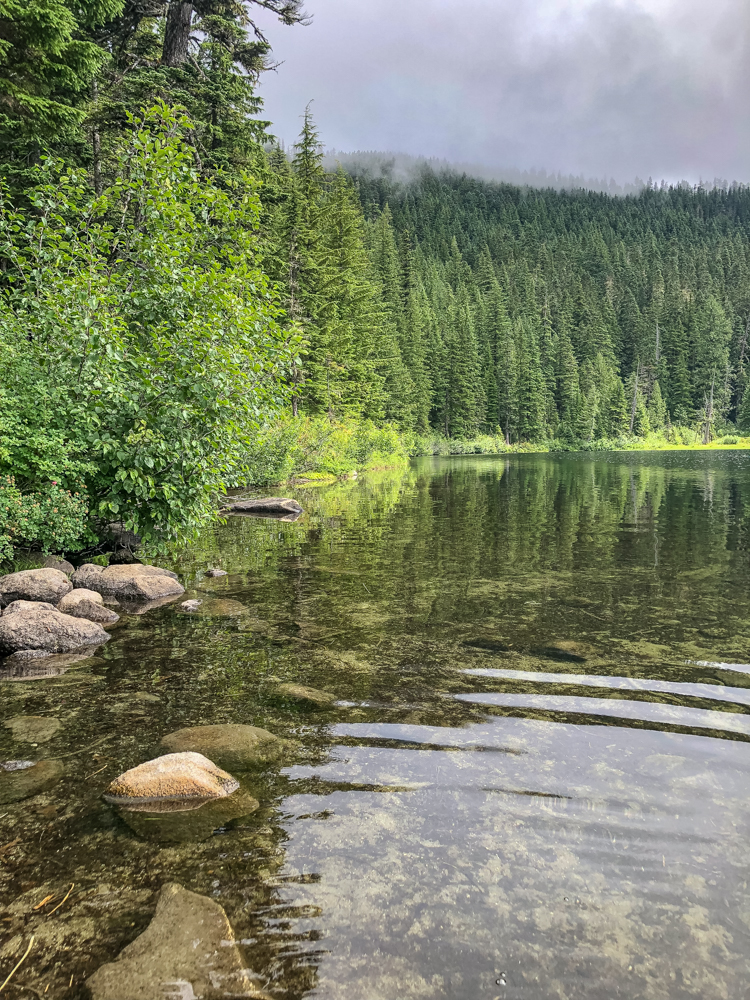 Wading along the shore of Olallie Lake on a beautiful summer day.