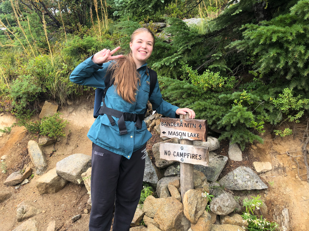 By the time we reached the sign at the turnoff for Bandera Mountain and Mason Lake, my daughter was more talkative, more engaged, and more cheerful, perhaps because the rain tapered off. Maybe because she knew we were getting close to the lake.