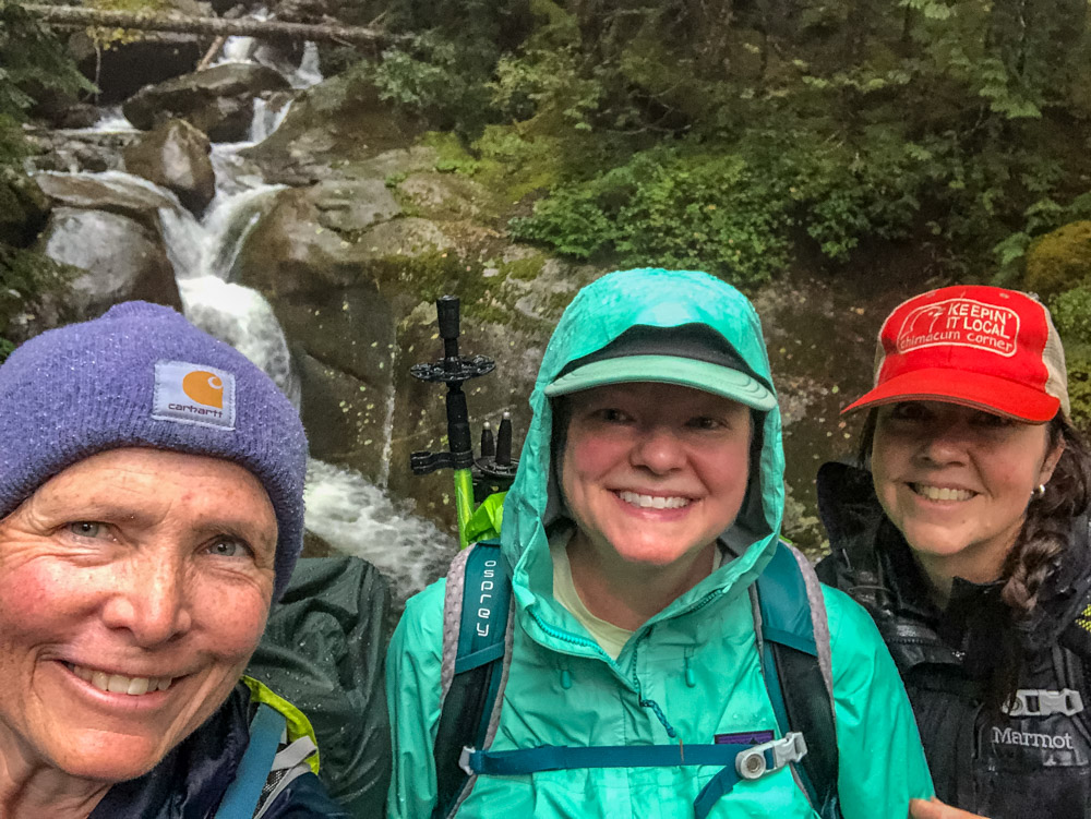 Connections between friends on a rainy, wet trip to Big Creek Falls.