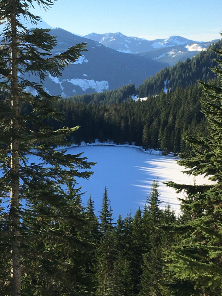 Olallie Lake iced over, from the Pratt Lake Trail overlook. Photo from an outing in December, 2020.