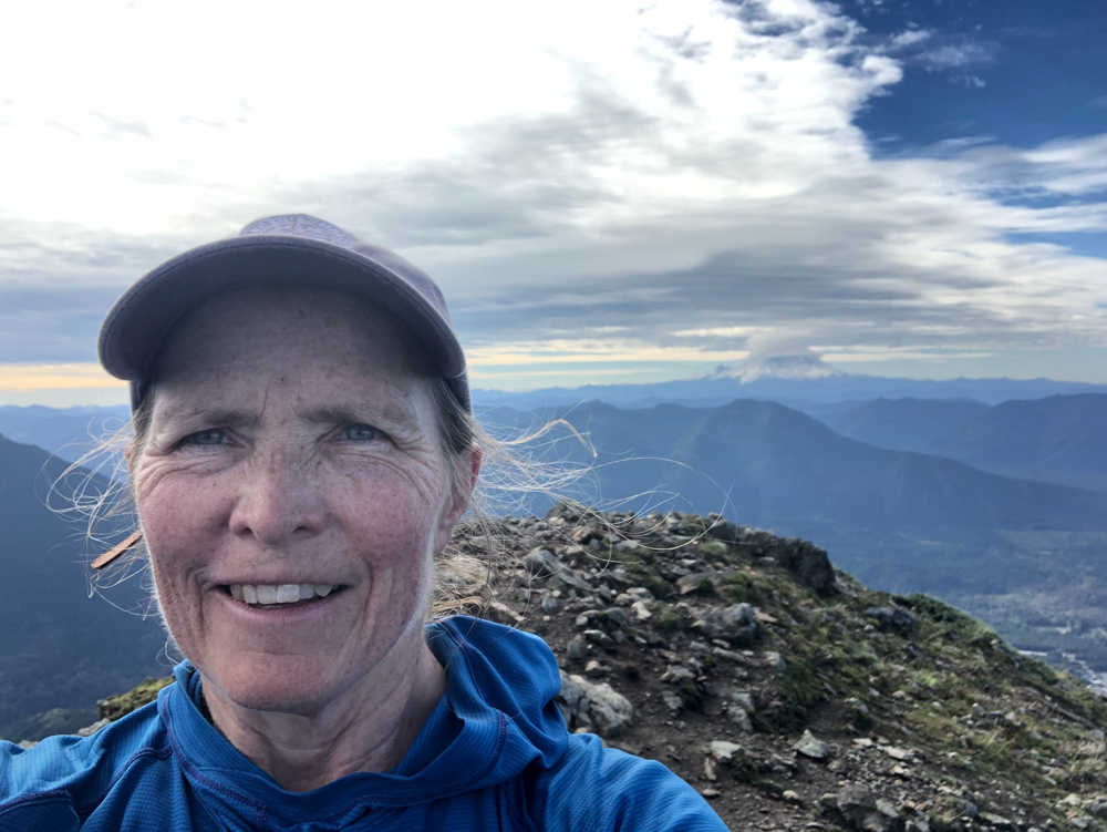 Solo hike on Teneriffe Peak with Mt. Rainier in the background.